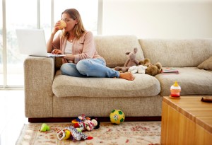Woman working on computer at home